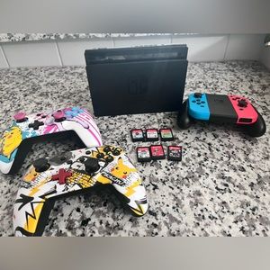 Nintendo Switch with games and controllers